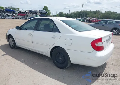 2002 Toyota Camry Le from USA, damaged, VIN 4T1BE32K02U501388